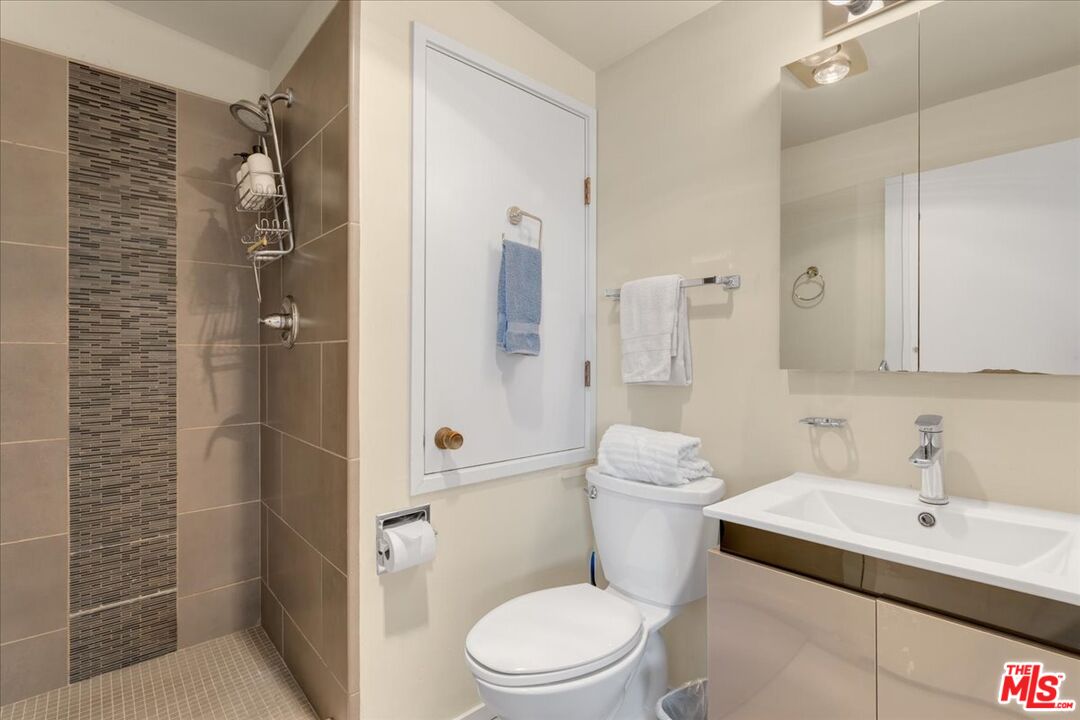 67 Pelican Point Watsonville, CA 95076 - Photo 15 of 25 a bathroom with a sink toilet and shower