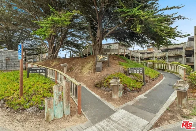a view of a balcony with an ocean view