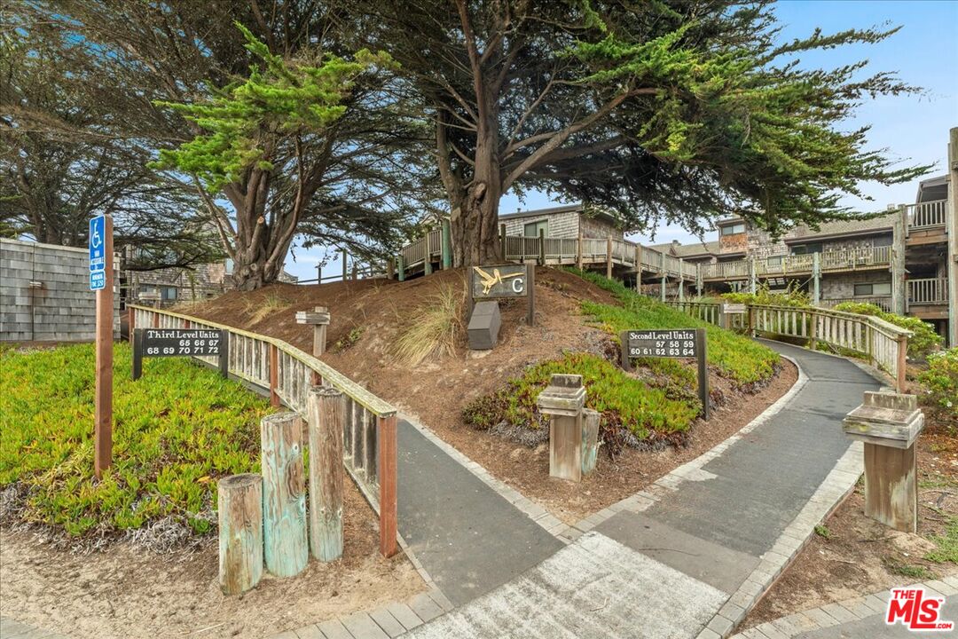 67 Pelican Point Watsonville, CA 95076 - Photo 22 of 25 a view of a swimming pool with a patio and a yard