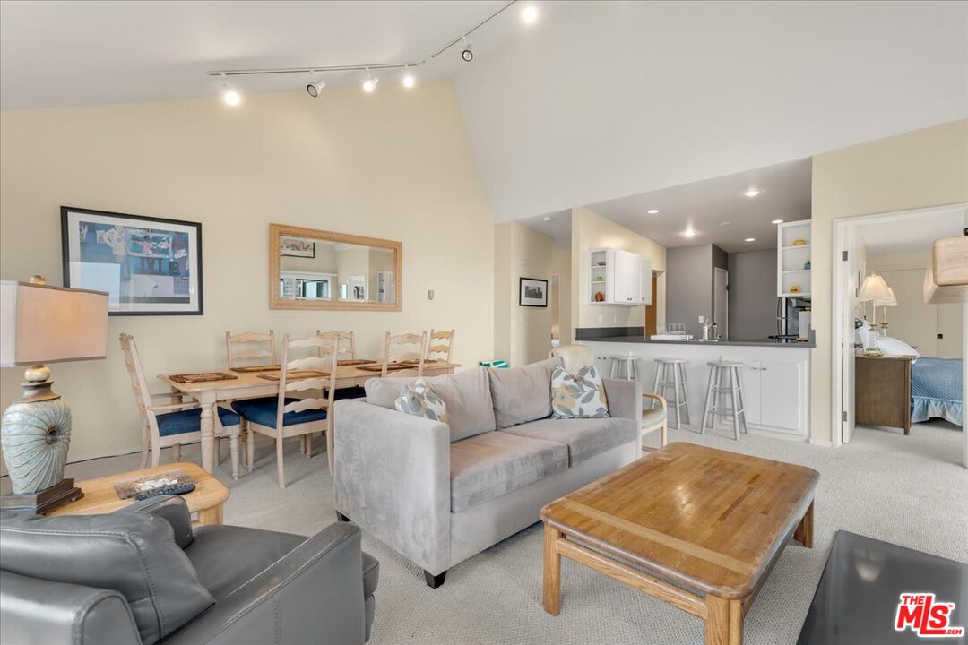 67 Pelican Point Watsonville, CA 95076 - Photo 9 of 25 a living room with furniture and a view of kitchen