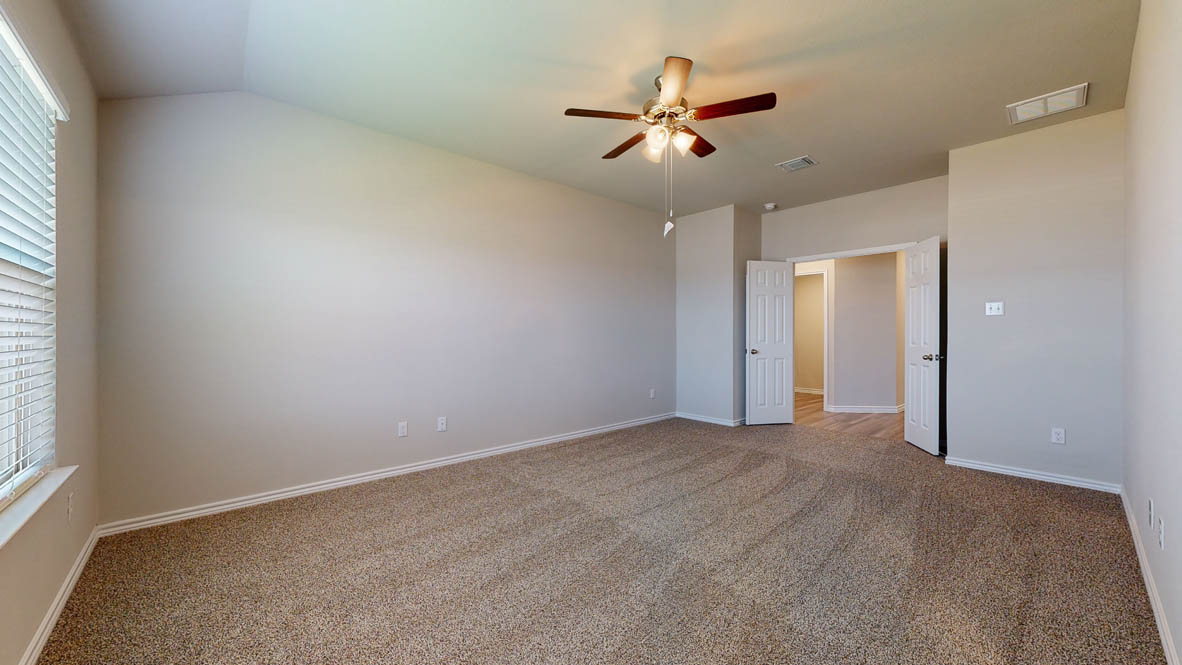 104 Kenzie Street Thorndale, TX 76577 - Photo 11 of 28 a view of an empty room with a window