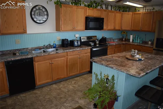 a potted plant sitting on a wooden floor next to a window
