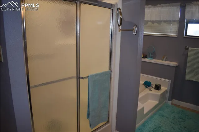 a bathroom with a sink toilet and mirror