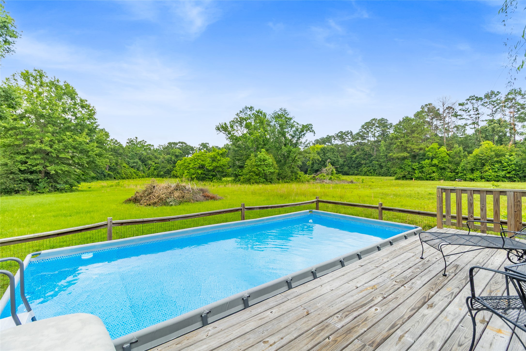 17821 Brown Road Conroe, TX 77306 - Photo 37 of 50 a view of swimming pool with a back yard
