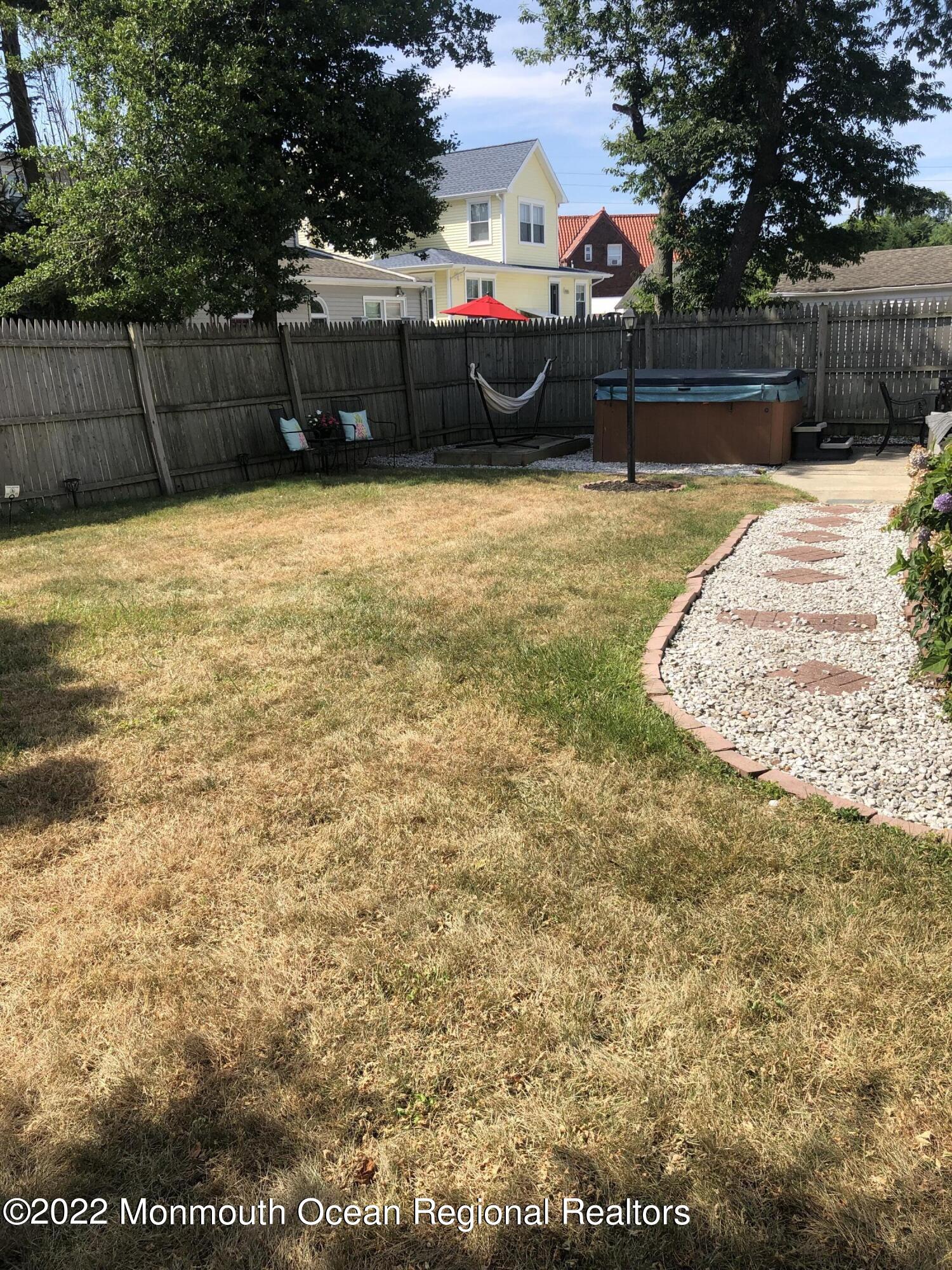 1717 River Road Belmar, NJ 07719 - Photo 23 of 25 a swimming pool that is in the backyard of house