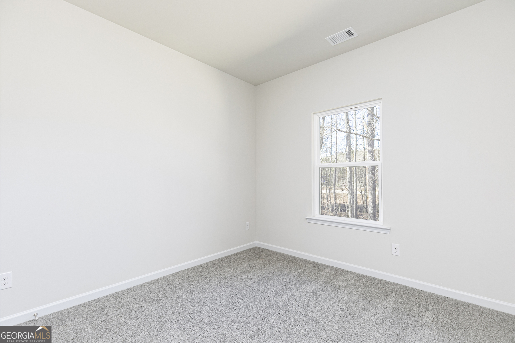 231 Rooker Drive LaGrange, GA 30241 - Photo 11 of 17 an empty room with a window