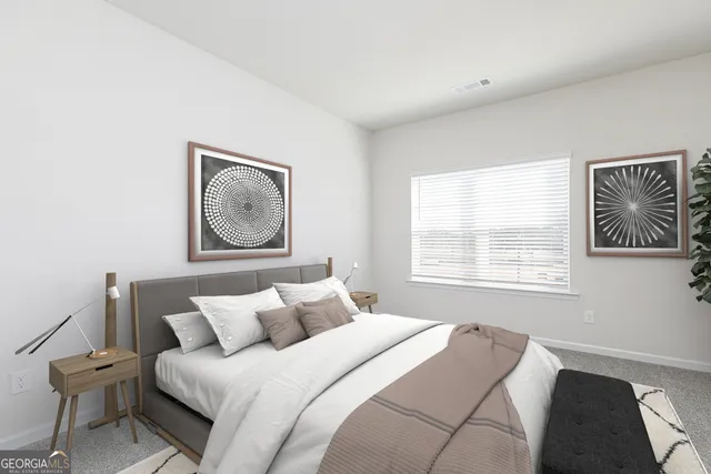 a bedroom with bed and a window