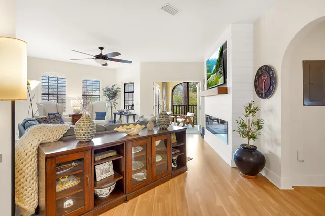 a large kitchen with a table and chairs