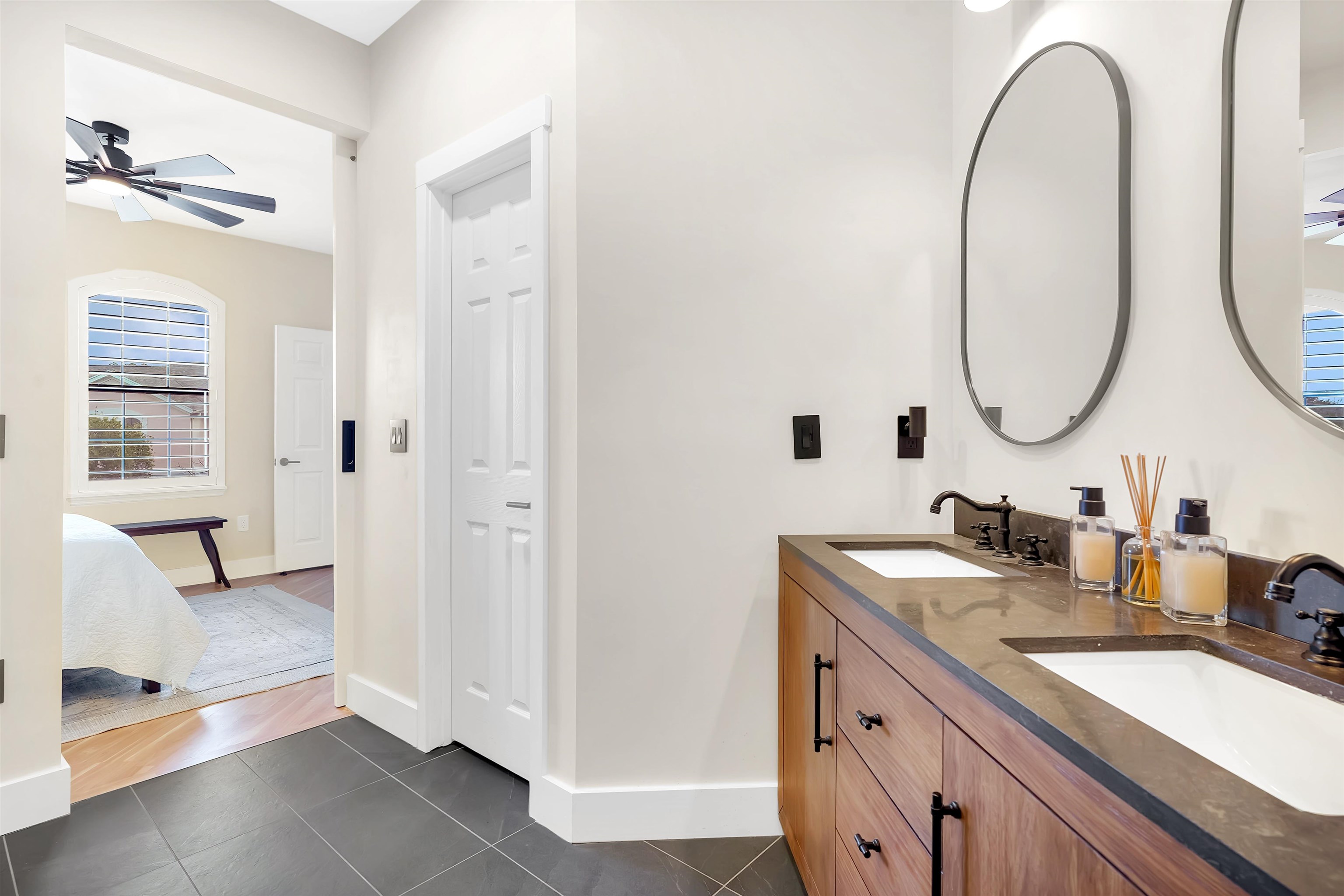 4629 Serena Circle St. Augustine, FL 32084 - Photo 20 of 47 a bathroom with a double vanity sink and a mirror