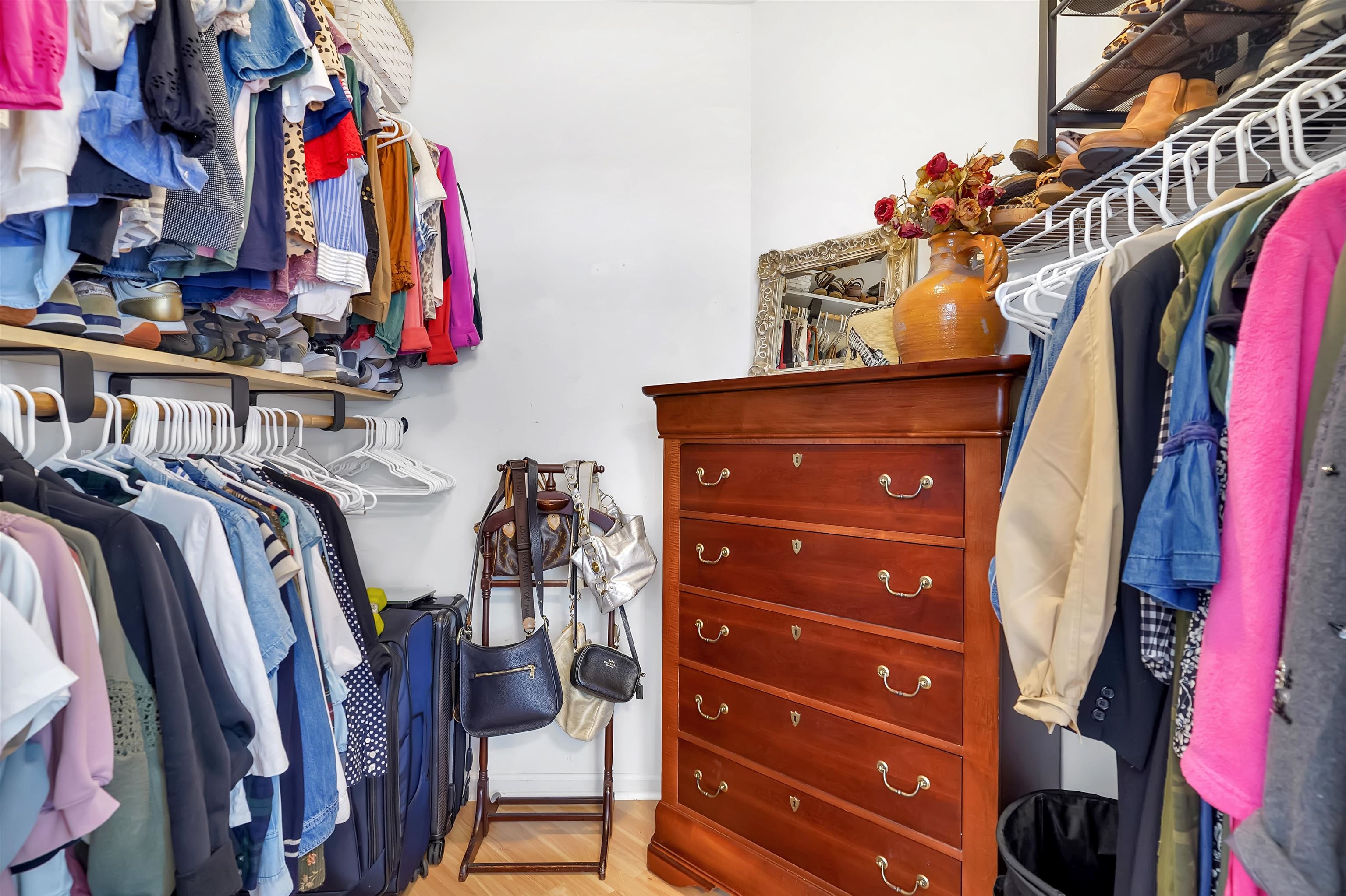 4629 Serena Circle St. Augustine, FL 32084 - Photo 22 of 47 a view of walk in closet with clothes and shoes