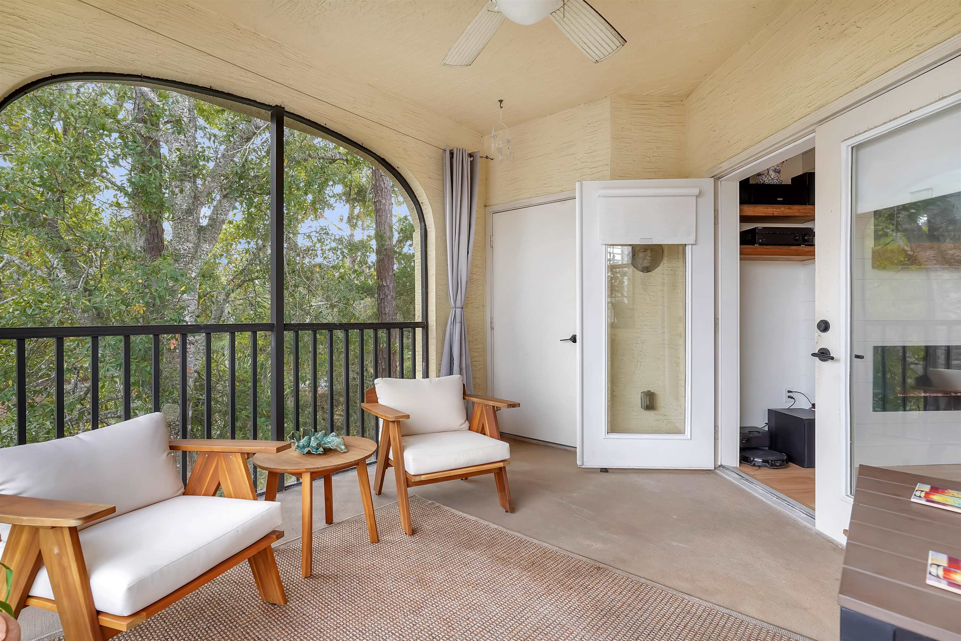 4629 Serena Circle St. Augustine, FL 32084 - Photo 31 of 47 a living room with furniture and a floor to ceiling window