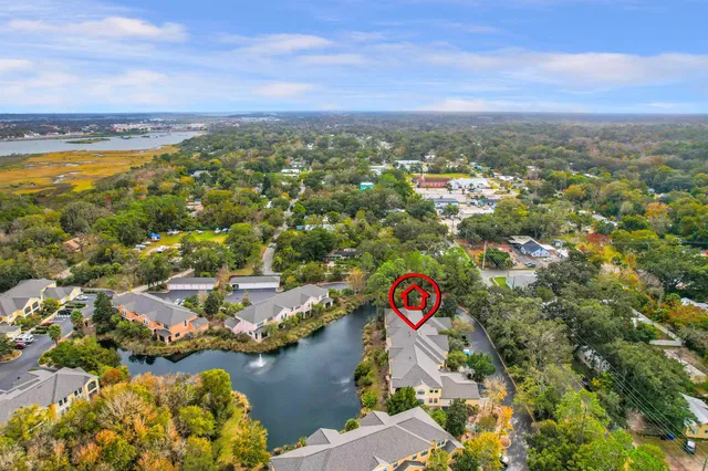 an aerial view of residential building and lake view
