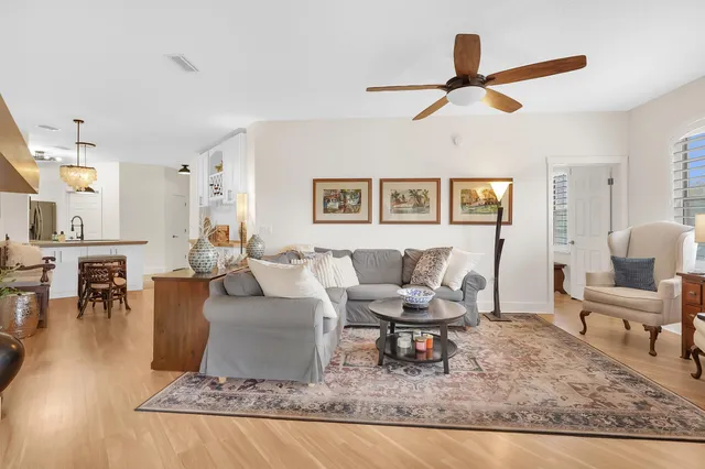 a living room with furniture and a rug