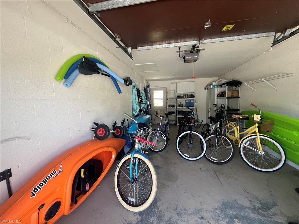 513 Lake Louise Circle, Unit 202 Naples, FL 34110 - Photo 2 of 15 a view of a room with gym equipment