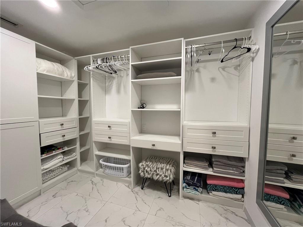513 Lake Louise Circle, Unit 202 Naples, FL 34110 - Photo 10 of 15 a walk in closet