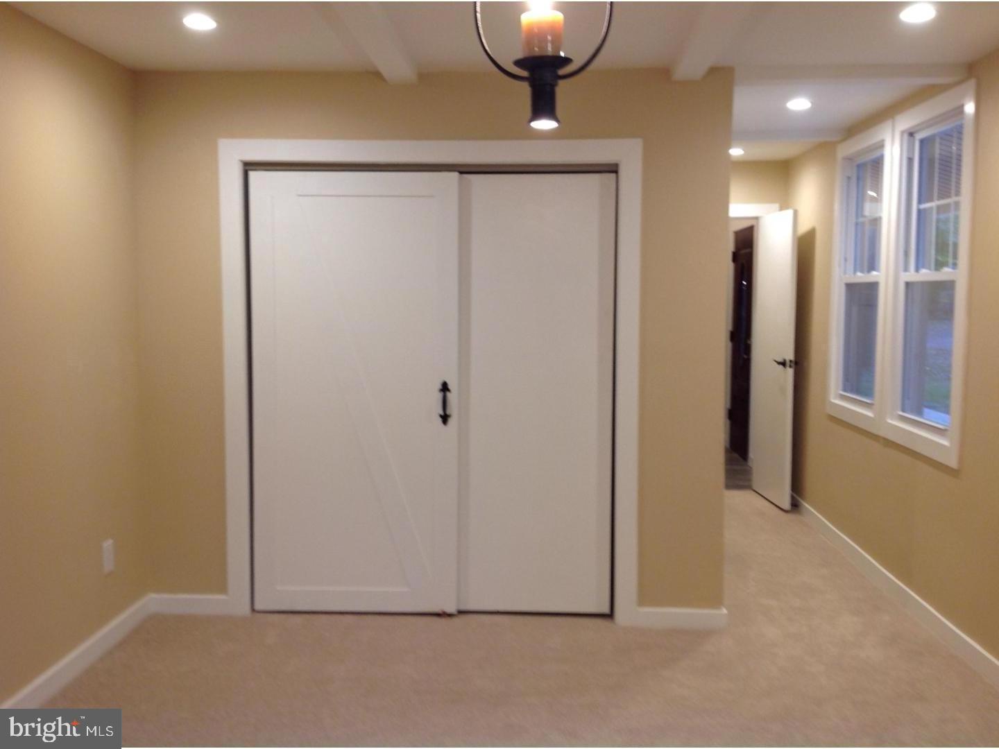 95 Duffield Street Willow Grove, PA 19090 - Photo 11 of 20 an empty room with wooden floor
