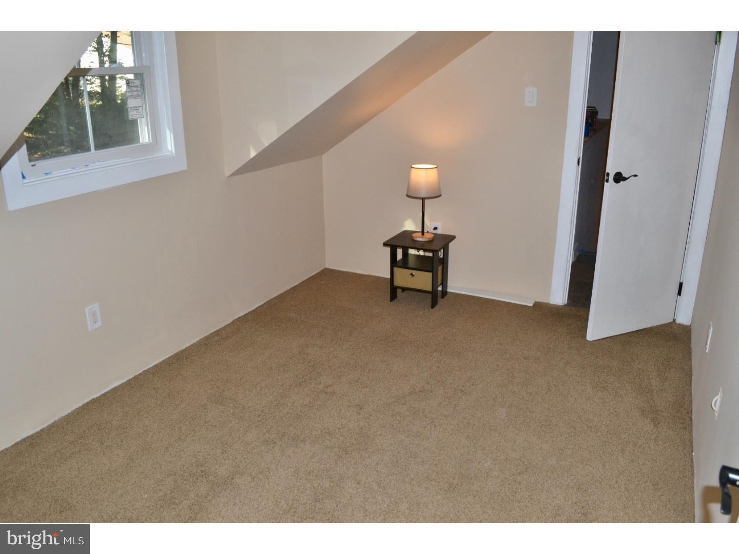 95 Duffield Street Willow Grove, PA 19090 - Photo 12 of 20 a view of an empty room with a window