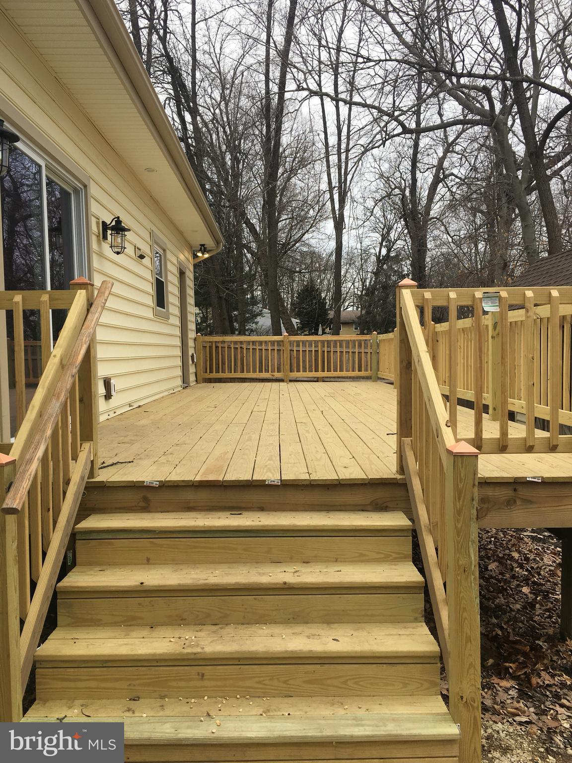 95 Duffield Street Willow Grove, PA 19090 - Photo 17 of 20 a view of backyard with wooden fence and large trees