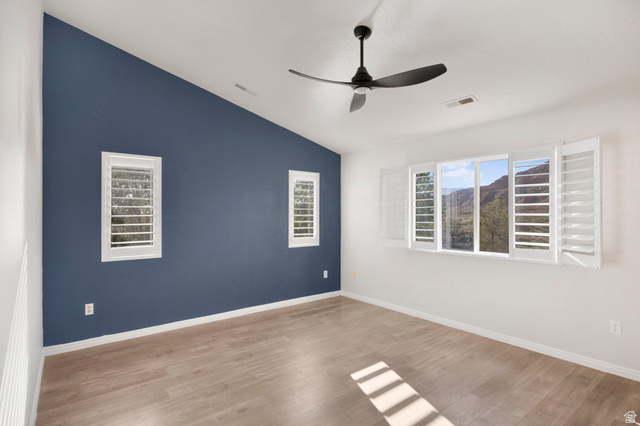 1440 West 100 South Virgin, UT 84779 - Photo 19 of 45 Room with vaulted ceiling, wood-finish flooring, and a ceiling fan