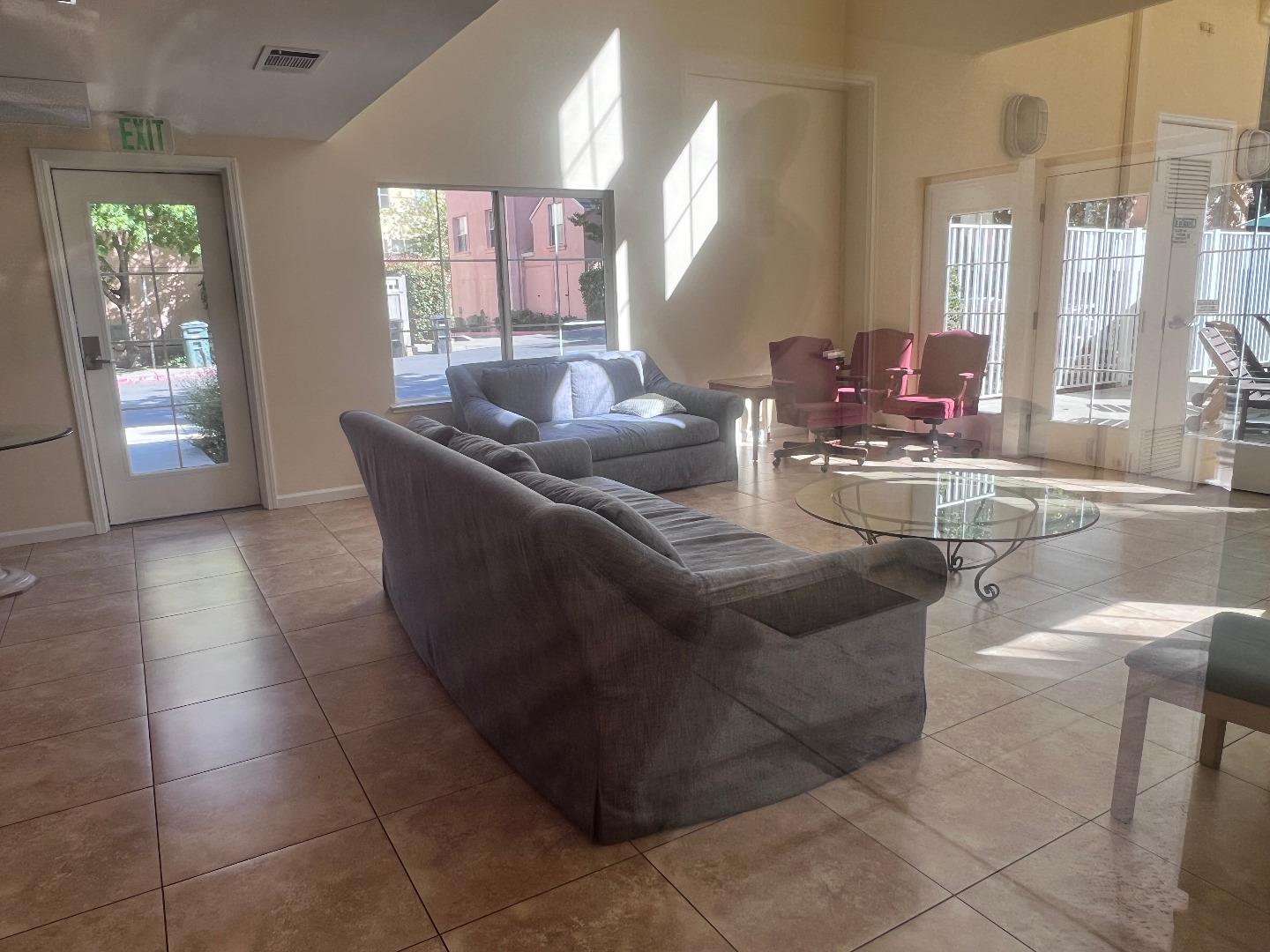 110 Whits Road Mountain View, CA 94040 - Photo 27 of 33 a living room with a large window