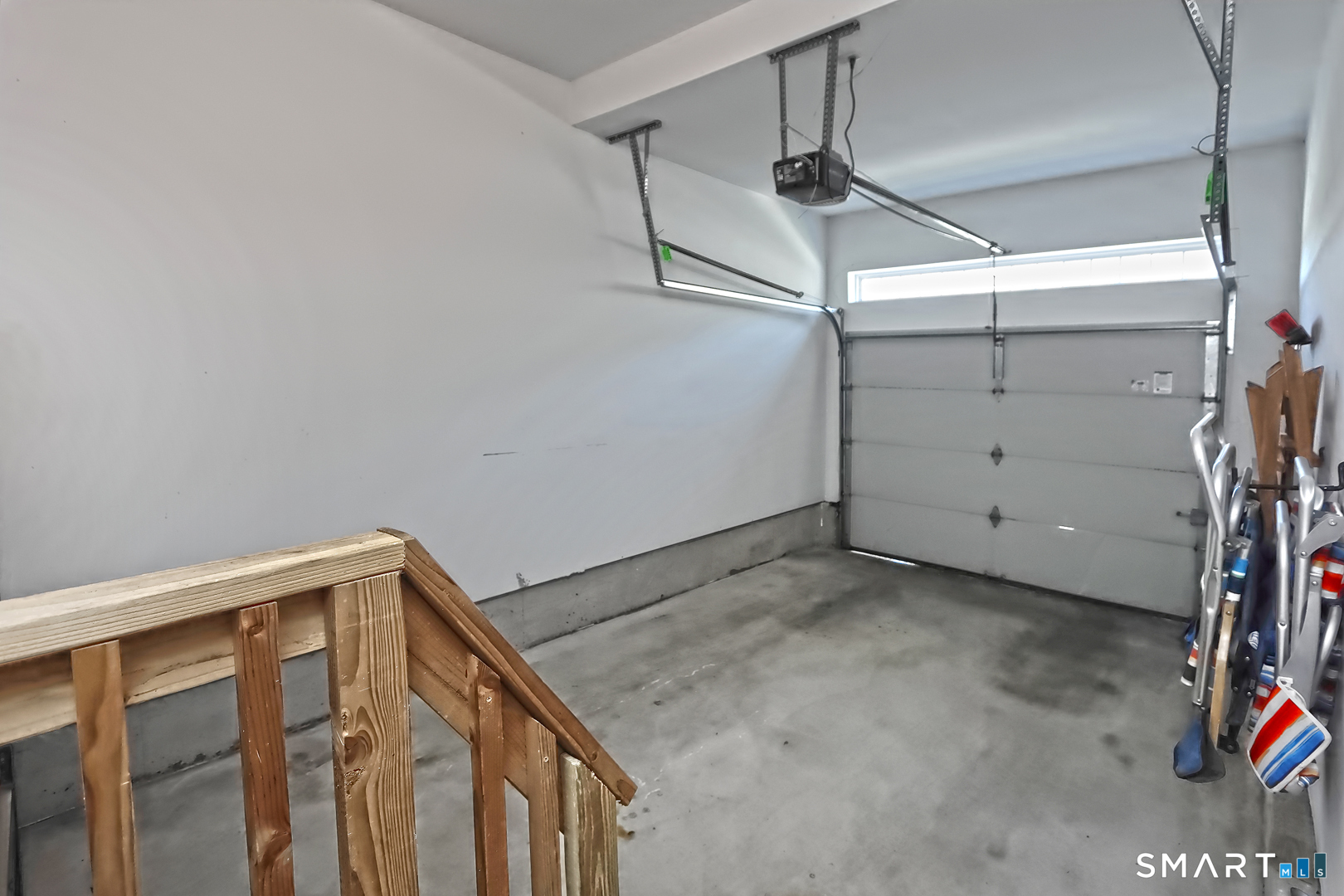 102 Lantern Court, Unit 102 Clinton, CT 06413 - Photo 8 of 36 a view of a garage