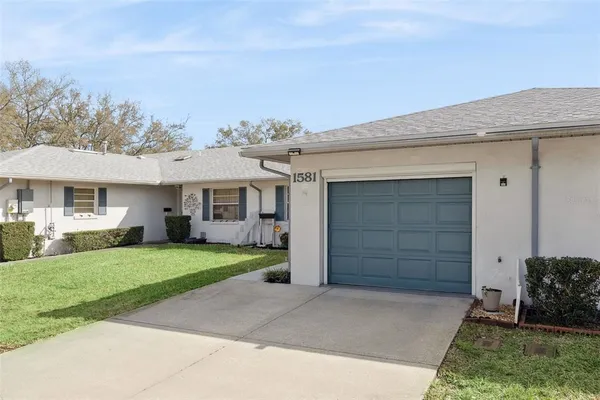 front view of a house and a yard