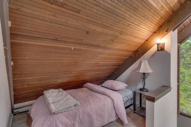 a view of an outdoor sitting area with furniture and backyard