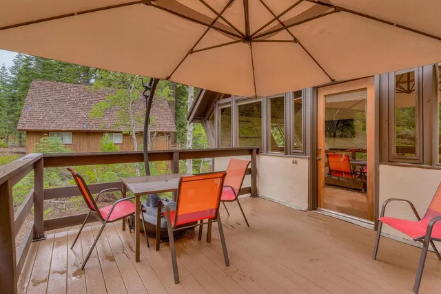a view of wooden floor and a lake view