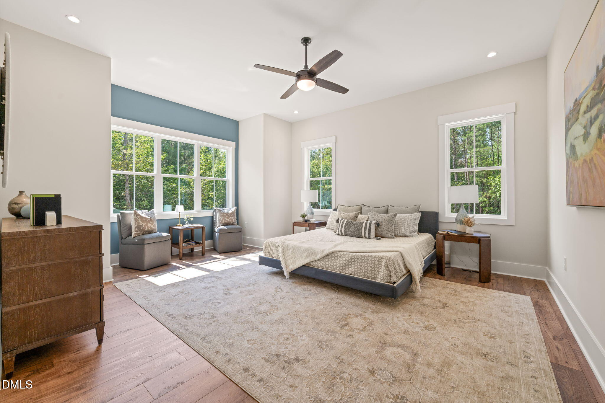 400 Pilot Ridge Road Zebulon, NC 27597 - Photo 24 of 51 a spacious bedroom with a bed and a couch