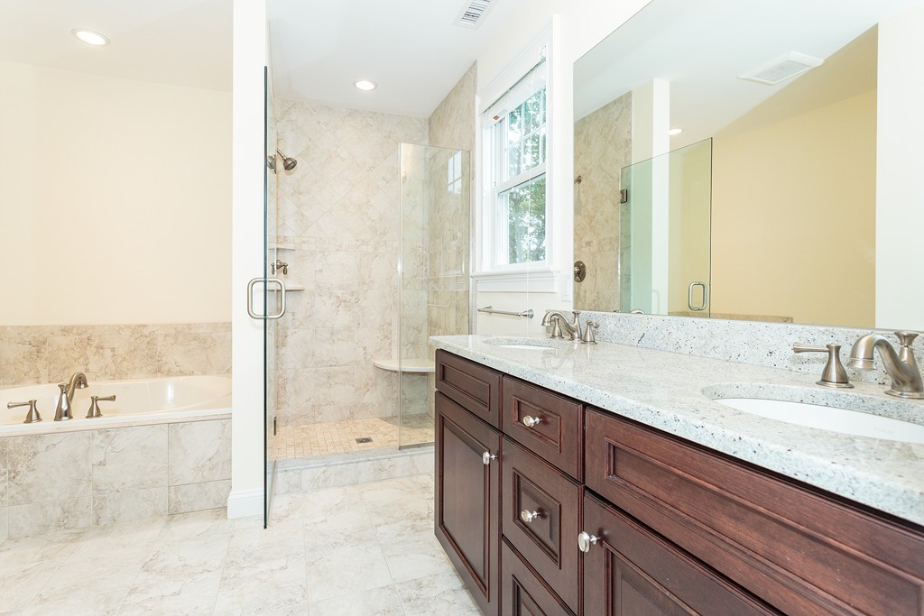 18 Shade Street Lexington, MA 02421 - Photo 18 of 23 a bathroom with a granite countertop sink mirror and double