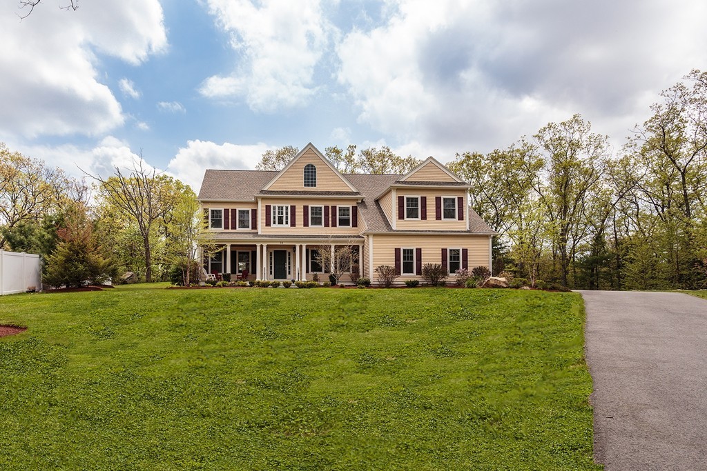 18 Shade Street Lexington, MA 02421 - Photo 23 of 23 a front view of a house with a garden