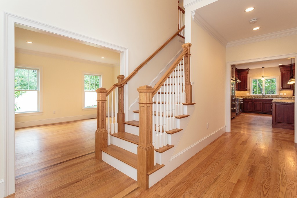 18 Shade Street Lexington, MA 02421 - Photo 3 of 23 a view of entryway and hall with wooden floor