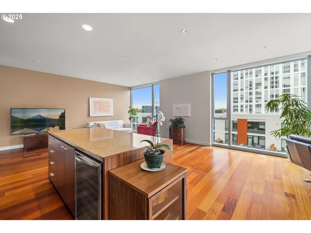 a kitchen that has a table and chairs in it