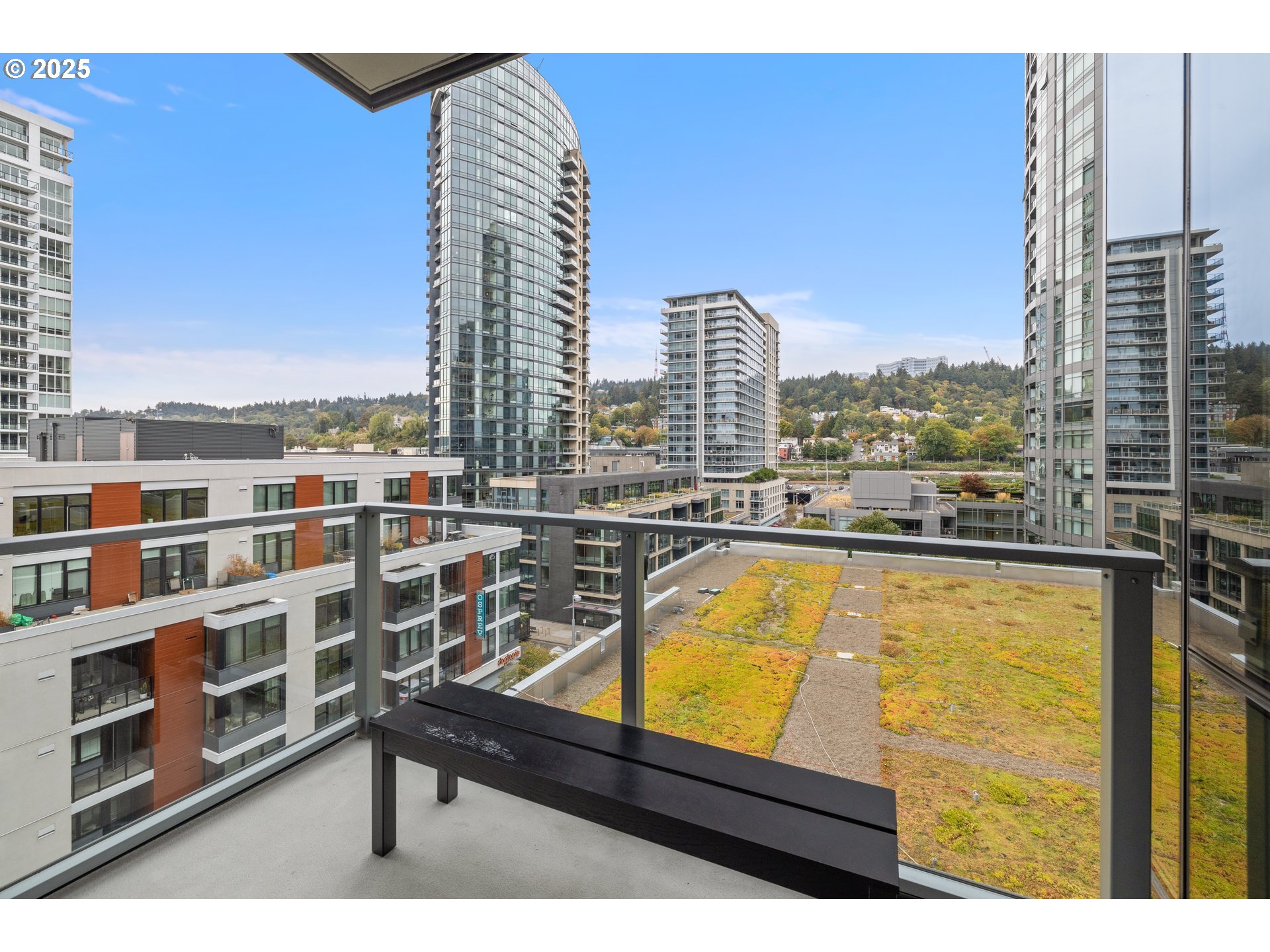 841 Southwest Gaines Street, Unit 714 Portland, OR 97239 - Photo 36 of 48 a view of swimming pool with outdoor seating and city view