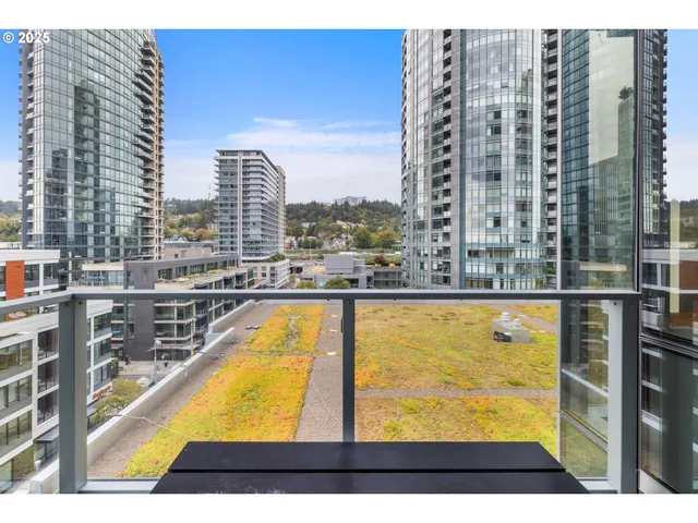 a view of swimming pool from a balcony