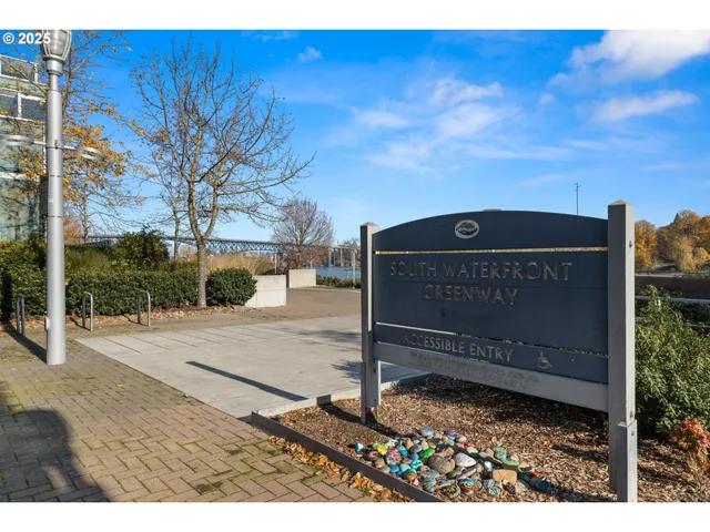 a view of a wooden fence and a sign board