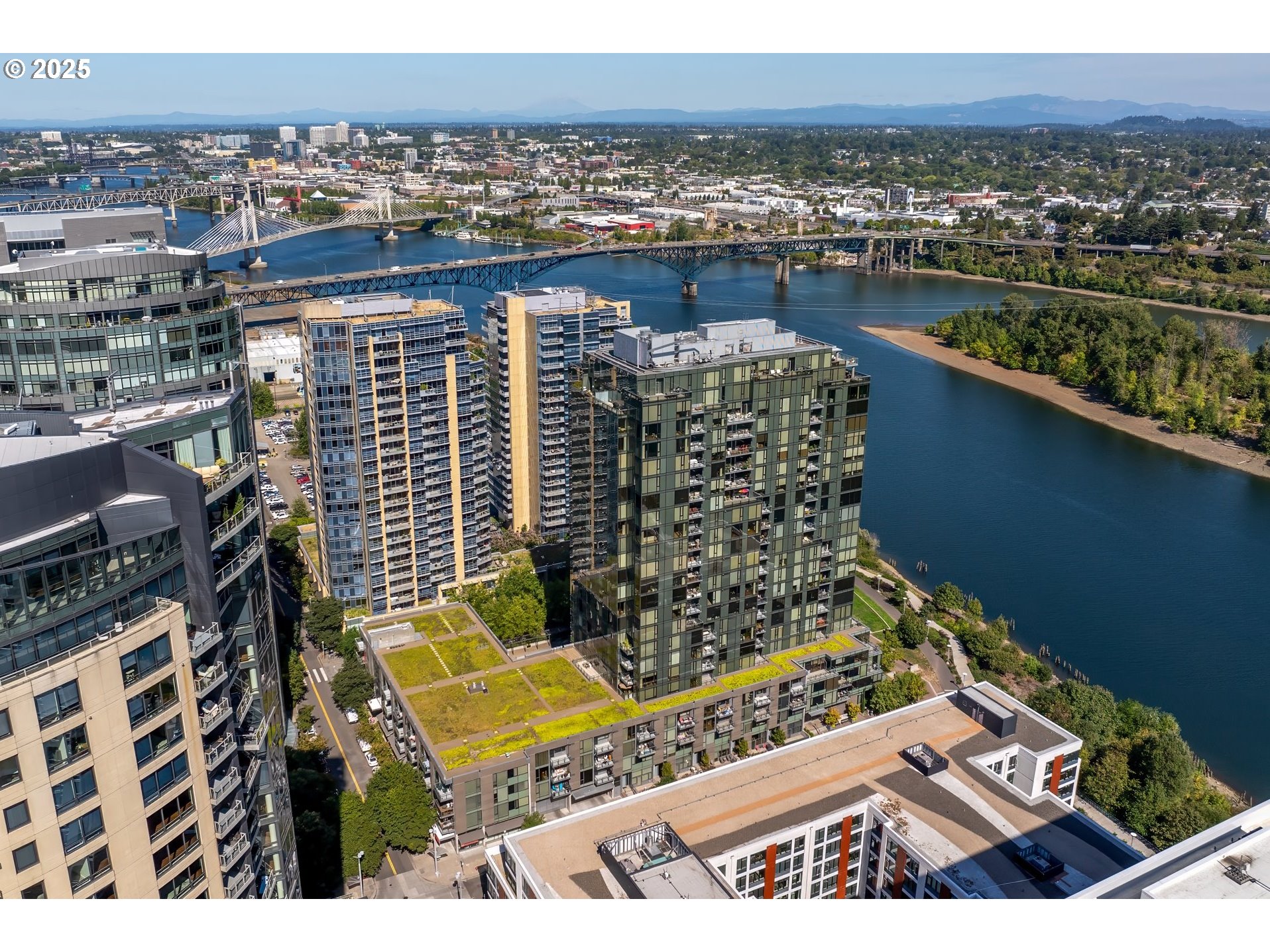 841 Southwest Gaines Street, Unit 714 Portland, OR 97239 - Photo 5 of 48 a view of a city with tall buildings