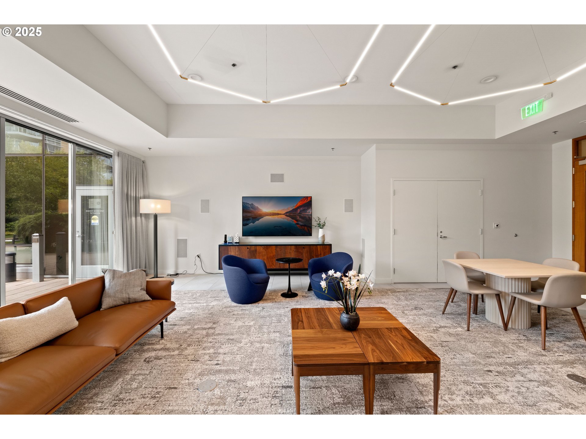 841 Southwest Gaines Street, Unit 714 Portland, OR 97239 - Photo 8 of 48 a living room with furniture and wooden floor