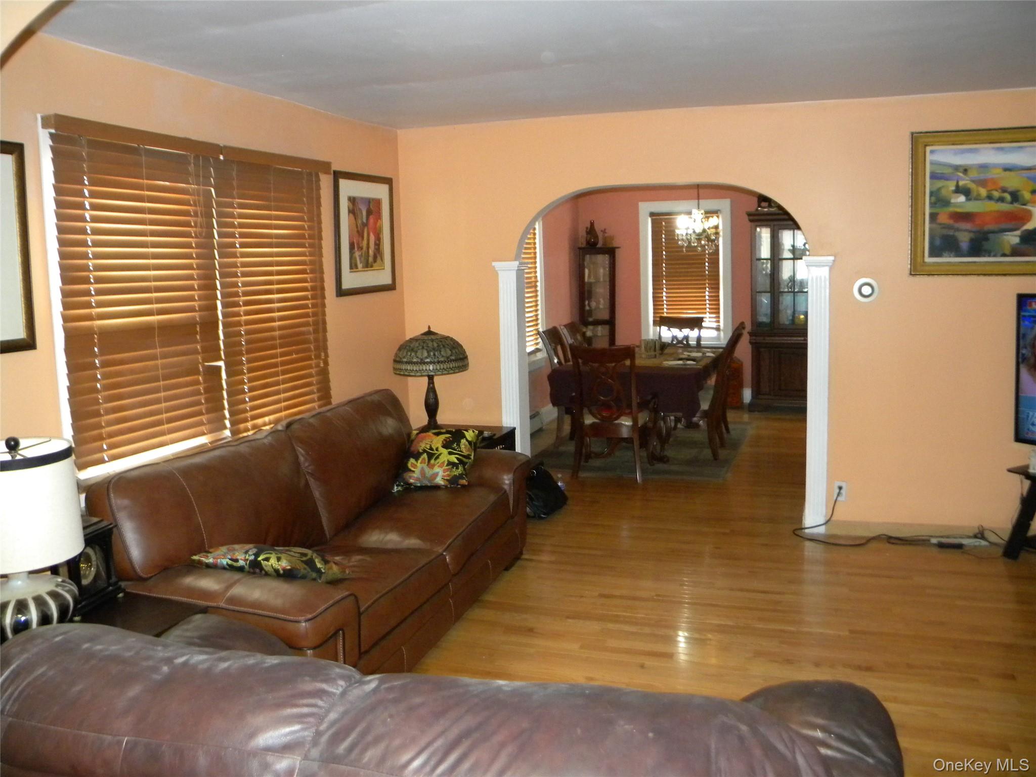 241-26 86th Road Queens, NY 11426 - Photo 6 of 38 a living room with furniture