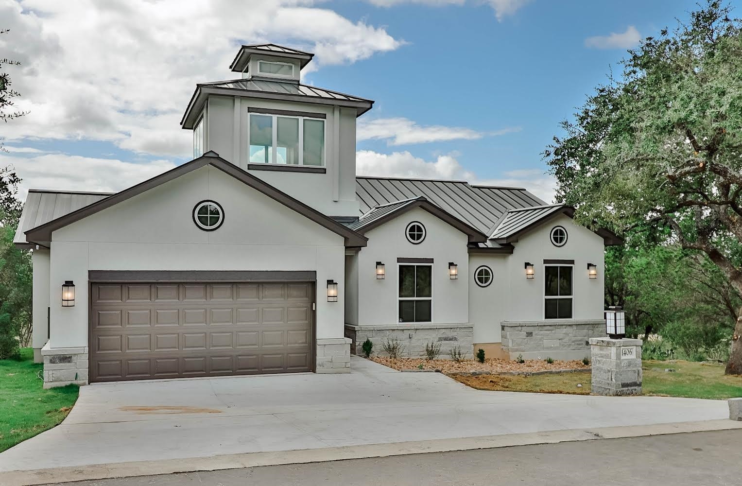 1406 Prospect Circle Horseshoe Bay, TX 78657 - Photo 1 of 1 a front view of a house with garden