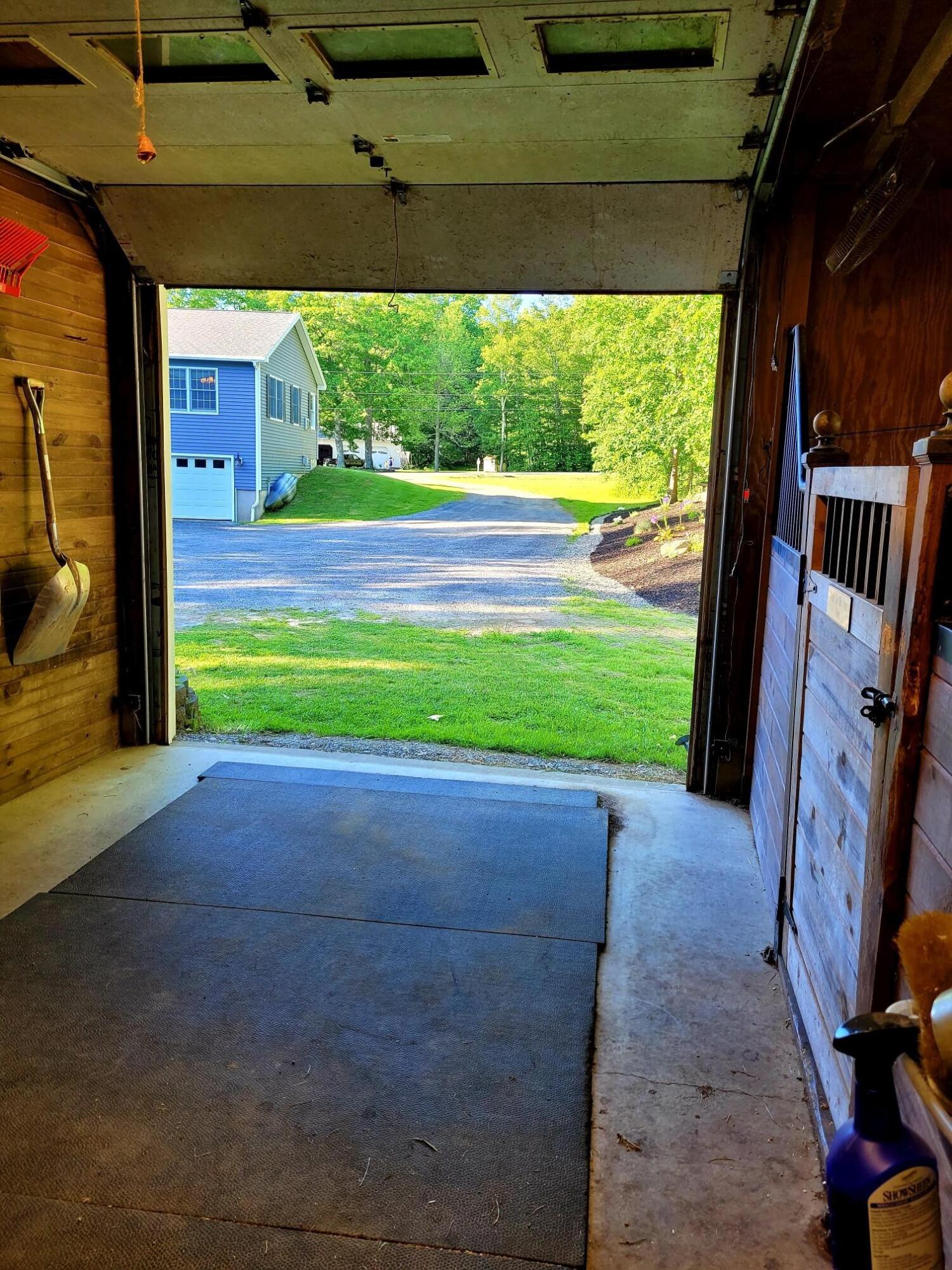 155 Kidder Road South China, ME 04358 - Photo 50 of 68 In barn looking down the driveway