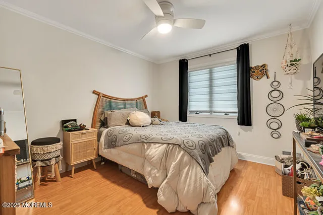 a bedroom with a bed and a table with chair