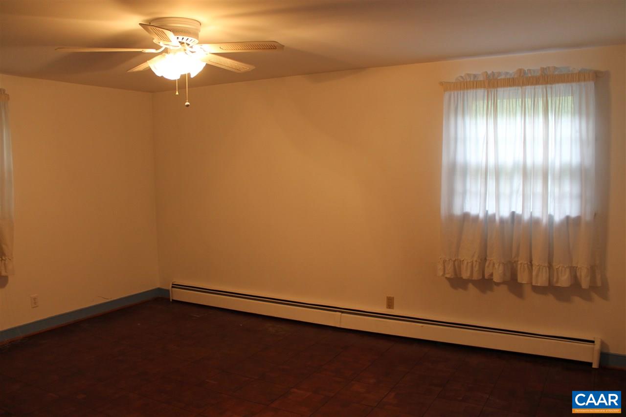 2414 Angus Road Charlottesville, VA 22901 - Photo 38 of 45 an empty room with a window