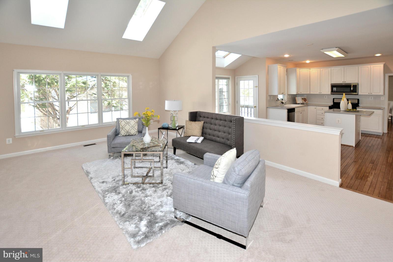 10838 Welbury Court Reston, VA 20194 - Photo 17 of 30 a living room with furniture and a large window