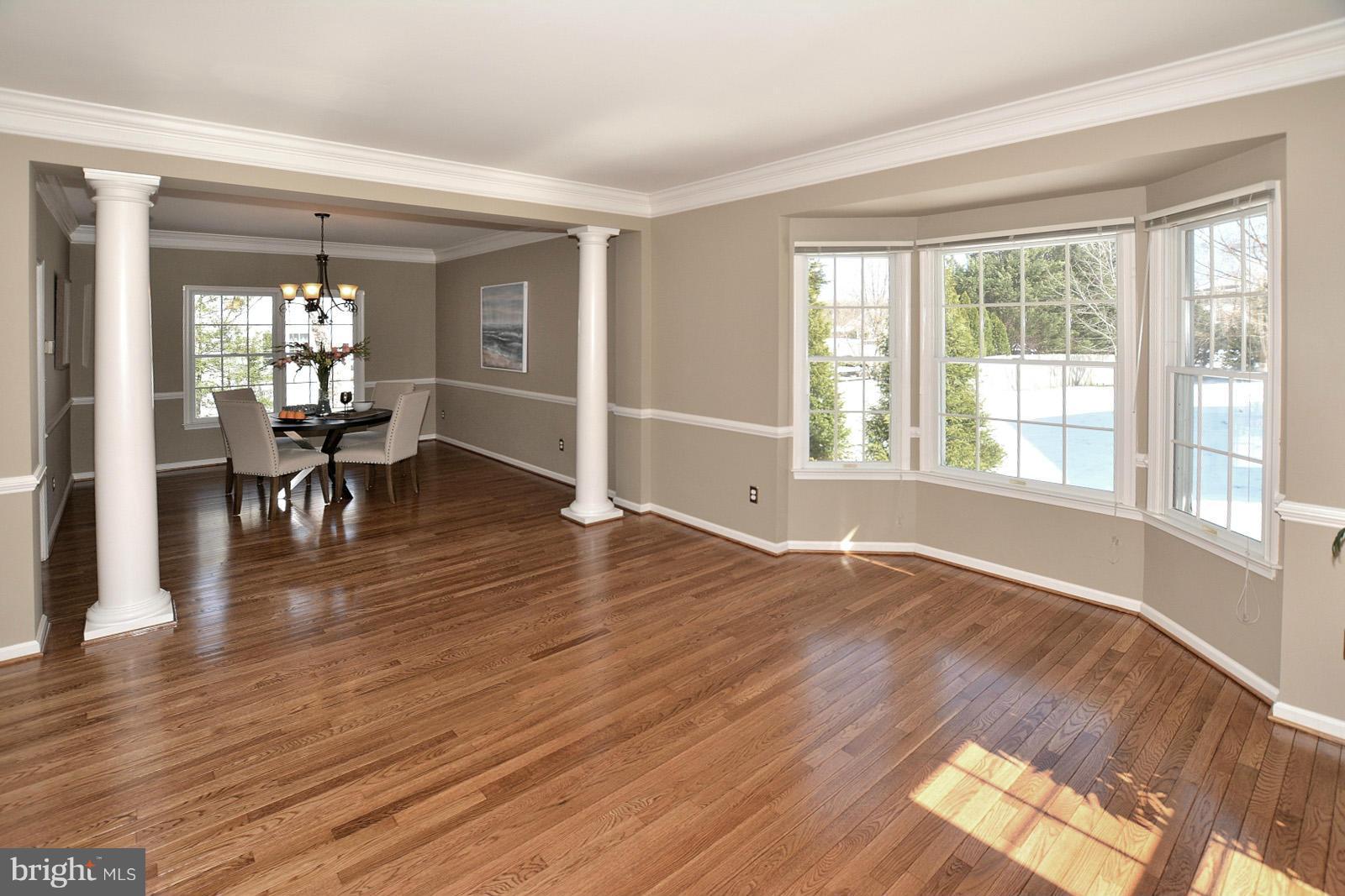 10838 Welbury Court Reston, VA 20194 - Photo 4 of 30 a view of empty room with wooden floor and fan