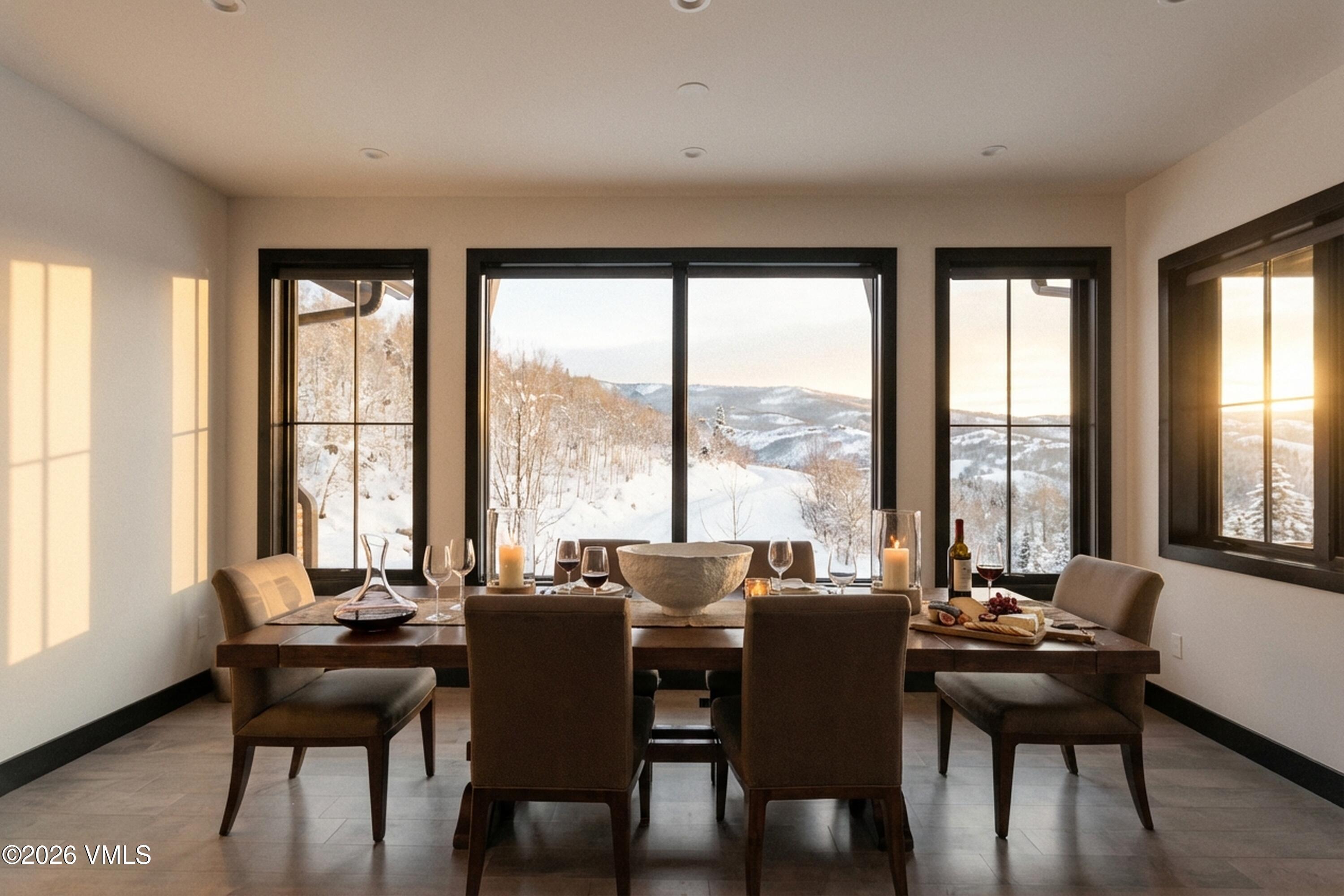 420 Little Andorra Road Edwards, CO 81632 - Photo 5 of 26 a view of a dining room with furniture and a large window