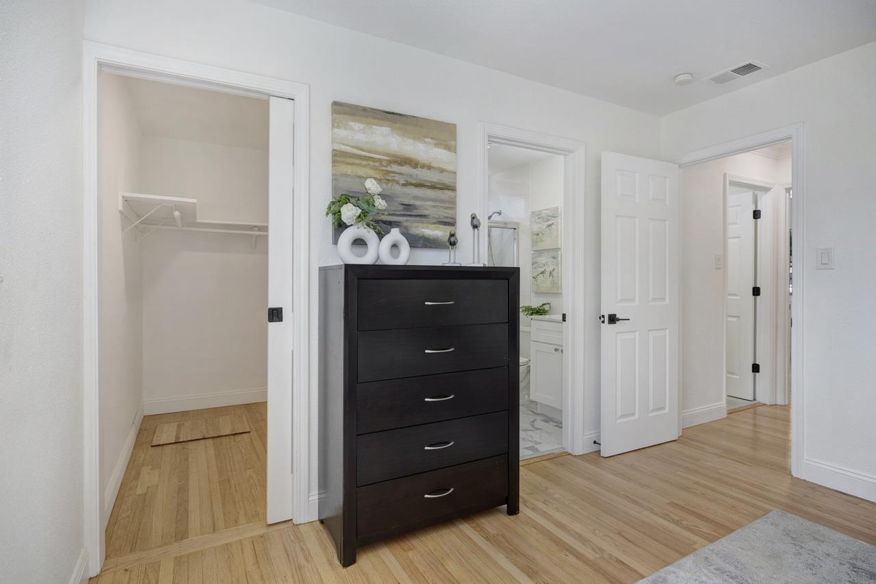 1075 Summerfield Drive San Jose, CA 95121 - Photo 21 of 38 a view of walk in closet with wooden floor
