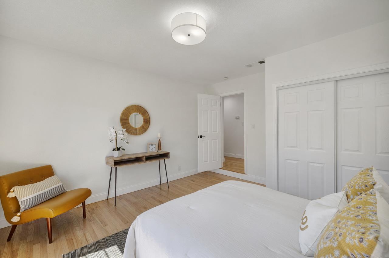 1075 Summerfield Drive San Jose, CA 95121 - Photo 29 of 38 a bedroom with a bed and a chair in it