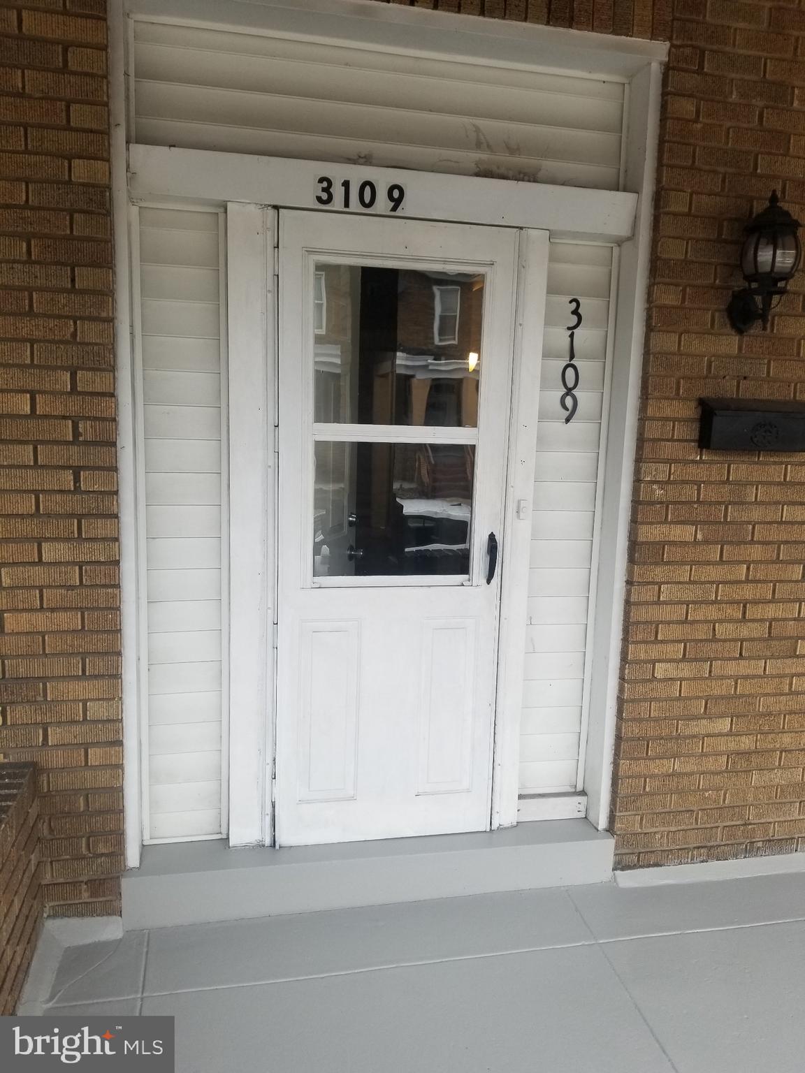 3109 Lawnview Avenue Baltimore, MD 21213 - Photo 1 of 23 a view of a entryway door of the house