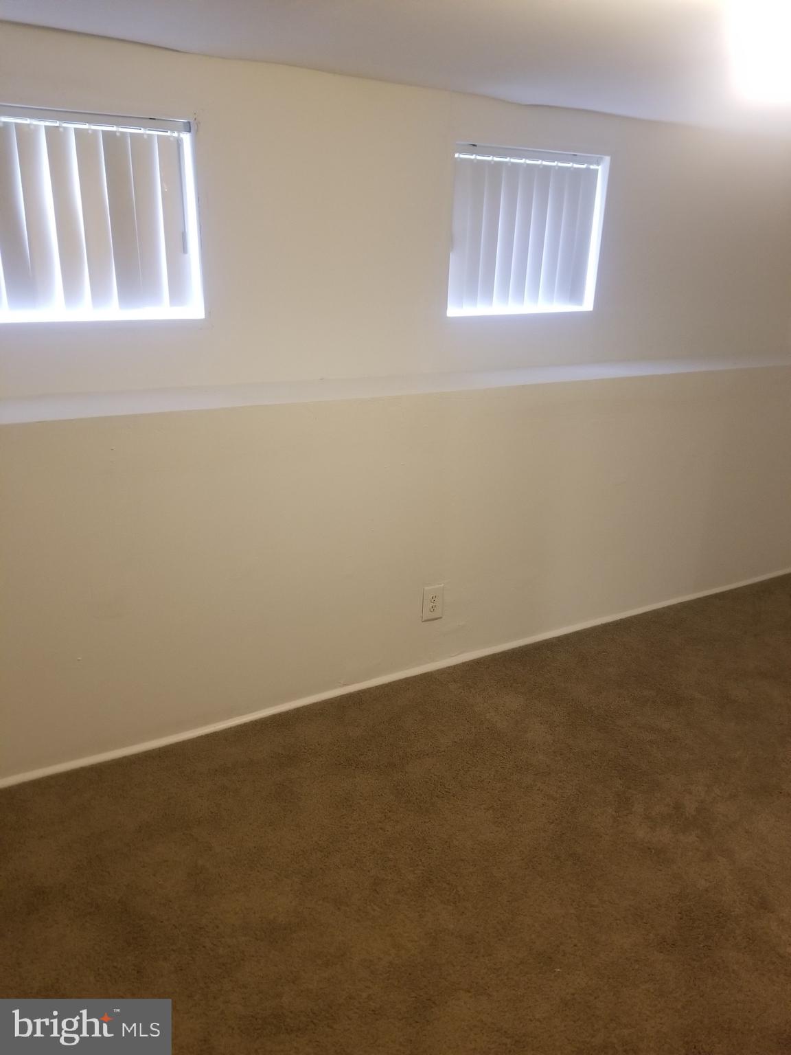 3109 Lawnview Avenue Baltimore, MD 21213 - Photo 20 of 23 an empty room with windows